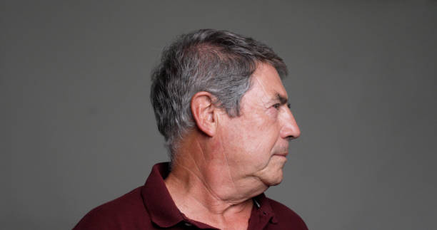 istock Serious Senior Man profile mugshot 1438460563
