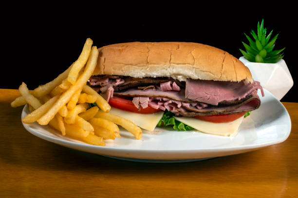 istock roast beef sub  with tomato lettuce and cheese 1438460675