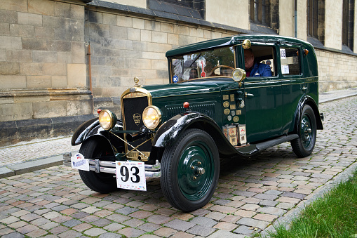 PRAGUE, CZECH REPUBLIC - OCTOBER 1, 2022: Vintage green Peugeot 201 car at the Prazska Noblesa event