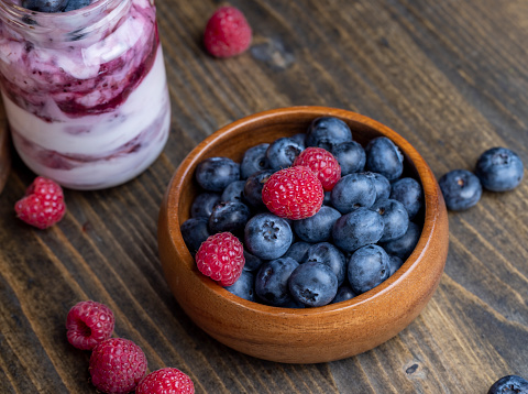 Ripe but long-lying blueberries on the table