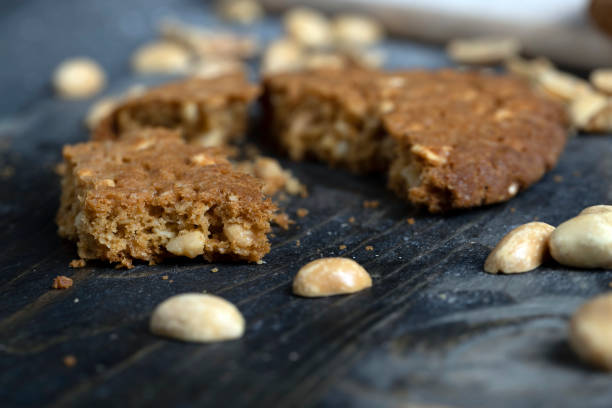 istock oatmeal cookies with peanuts on a black wooden table 1438463602