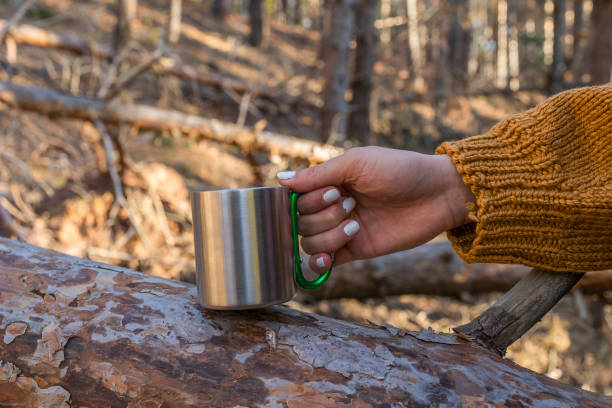istock Girl's hand holding coffee salt 1438465547