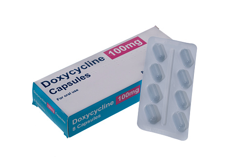 A box of generic Doxycycline antibiotic pills. It is used to treat bacterial pneumonia, acne, chlamydia infections, Lyme disease, cholera, typhus, and syphilis.