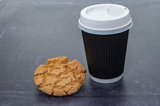 Take out coffee and a cookie biscuit