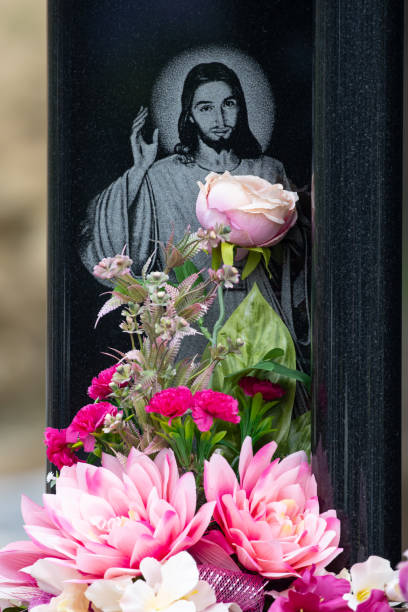 istock Flowers on the grave 1438473902