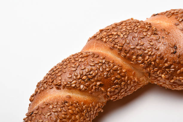 Simit, rosquilla, a circular bread, typically encrusted with sesame seeds or, less commonly, poppy, flax or sunflower seeds, found across the cuisines of the former Ottoman Empire, gevrek, crisp