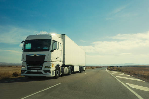 istock Freight truck on the road. 1438476474