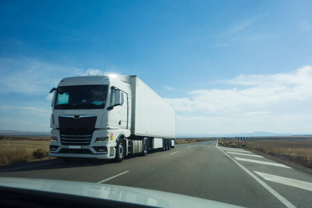 istock Freight truck on the road. 1438476509