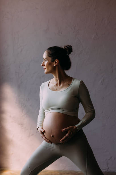 istock Pregnant Woman Exercising 1438477788