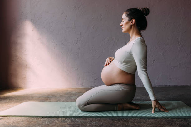 Pregnant Woman Relaxing After Her Workout