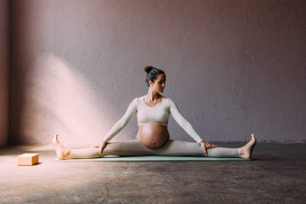 istock Woman Doing Yoga On The Mat 1438477824