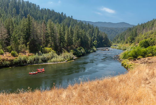 Rafting down the Rogue River in southern Oregon.  The  Rogue was one of the original eight rivers named in the Wild and Scenic Rivers Act of 1968.