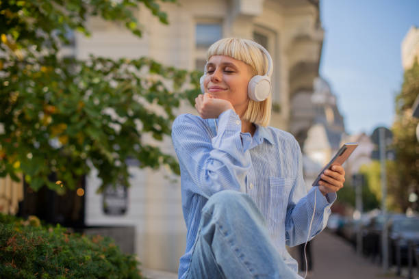 istock Girl enjoying music 1438498584