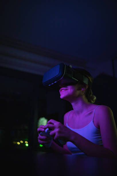 istock woman in vr glasses plays virtual reality game in metaverse universe and experiences different emotions 1438500603