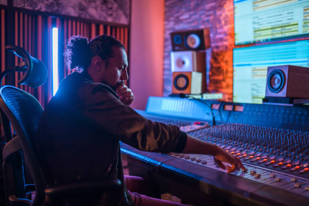 istock Man Operating With Sound Recording Studio Mixer 1438504721
