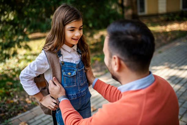 istock Father take their nine-year-old daughter to school 1438508022