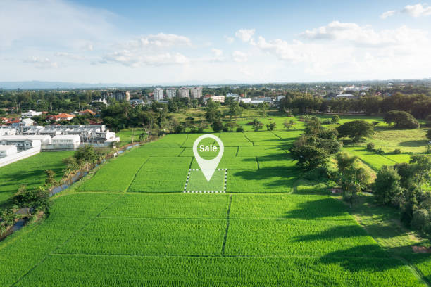 istock Land plot in aerial view with concept for sale. 1438510227