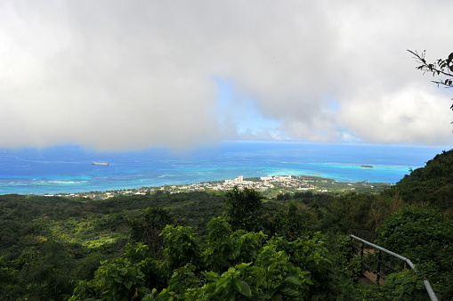 Saipan, Northern Mariana Islands- February 10,2011: In Northern Pacific Ocean, the Northern Mariana Islands is the territory of USA and its landscape is very beautiful. Here is the wonderful panorama view seen from the toppest Tagpochau Peak in Saipan Island.