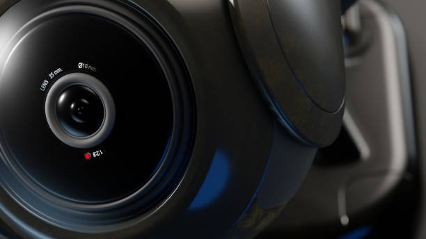 istock Close up camera lens. CCTV camera security installed on wall of the building. 1438515699