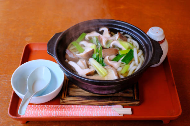Wild vegetable Udon noodle Vegetable udon noodles are sold in many natural attraction locations in Japan, especially in mountain areas where meat is hard to come by. nabari photos stock pictures, royalty-free photos & images