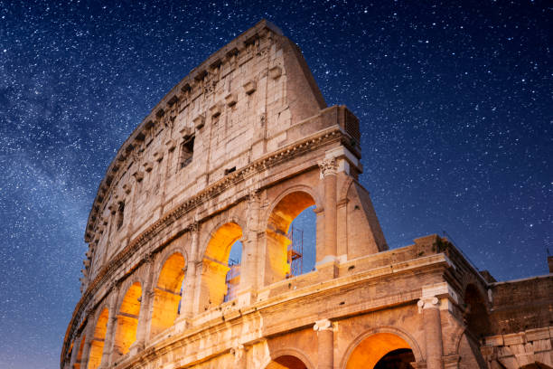 roman colosseum starry night - rome imagens e fotografias de stock