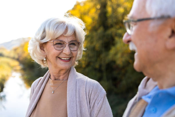 istock Senior couple enjoying a walk 1438526804