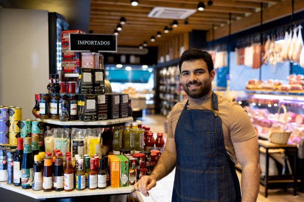 istock Man working at a supermarket selling imported spices 1438530749