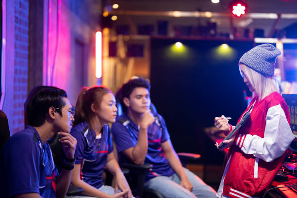 istock Asian woman coach explains their strategy to the team. 1438540692