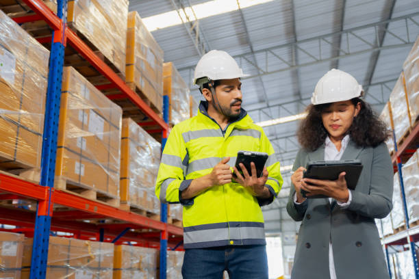 istock Manager checking the stock in the warehouse. 1438543537