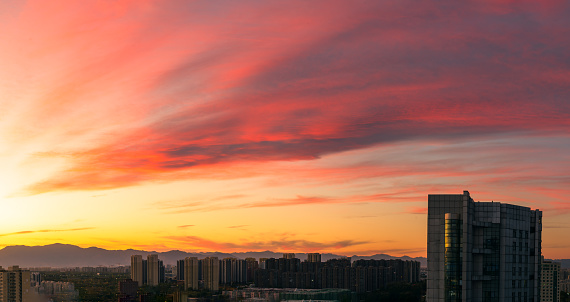 High Angle View Of Buildings Against Sky During Sunset