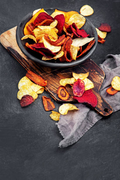 istock Bowl of healthy colorful vegetable chips 1438546030