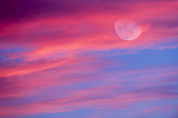 istock Sunset Moon Clouds Colorful Sunset Ethereal Pink Blue Sky 1438546057