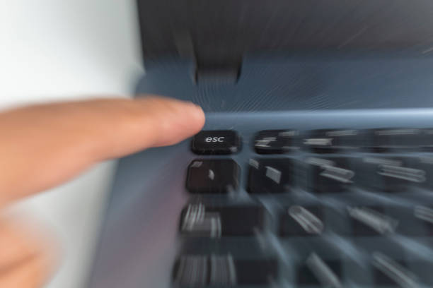 istock out of focus esc key button 1438549911