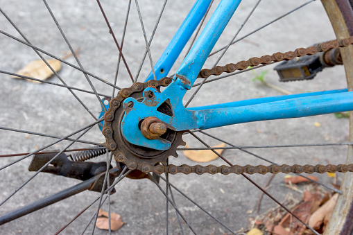 closeup rear wheel with chain and sprocket