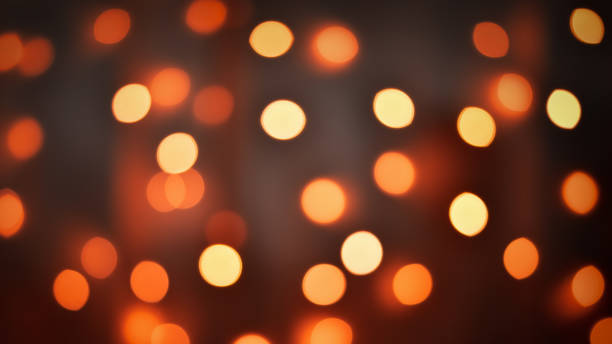 istock Red orange Christmas party bokeh lights background 1438550808