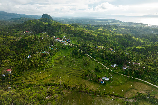 Aerial of the Bohol countryside in the town of Tubigon. Ilijan Hill can seen in the back.