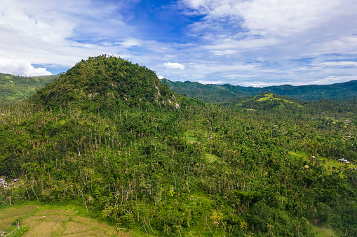 View of Ilijan Hill, a rare massive volcanic plug made of solid magma found in Tubigon, Bohol, Philippines.