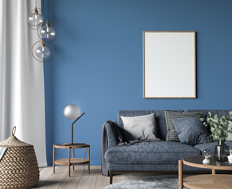 Dark living room interior, blue sofa with wooden home accessories in modern cozy apartment