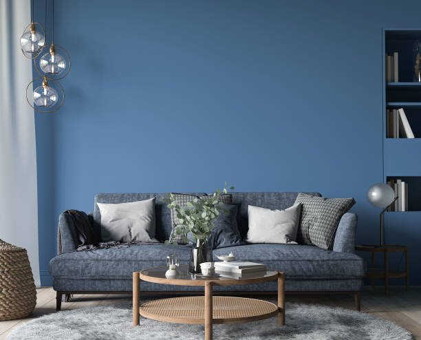 Dark living room interior, blue sofa with wooden home accessories in modern cozy apartment stock photo