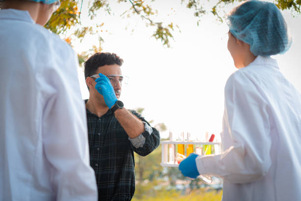 istock Scientists team collect water samples for analysis and research on water quality, environment with saving earth. 1438555559