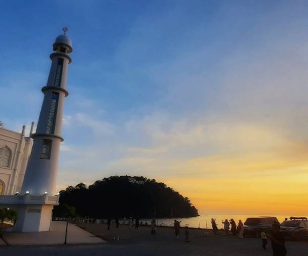 istock Sunset at Masjid Al Hakim beach But the Padang 1438566014