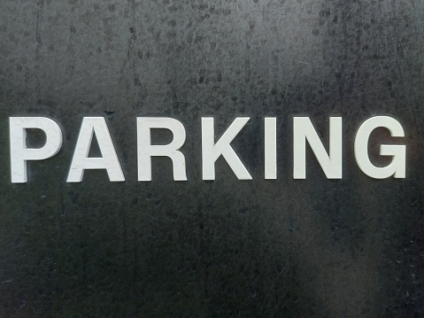 parking text on black background