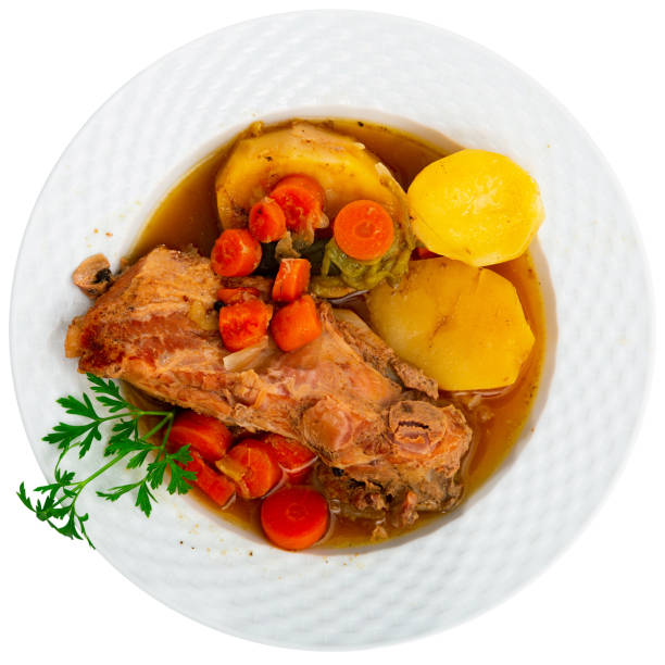istock Stewed pork ribs with potato and vegetables 1438568188