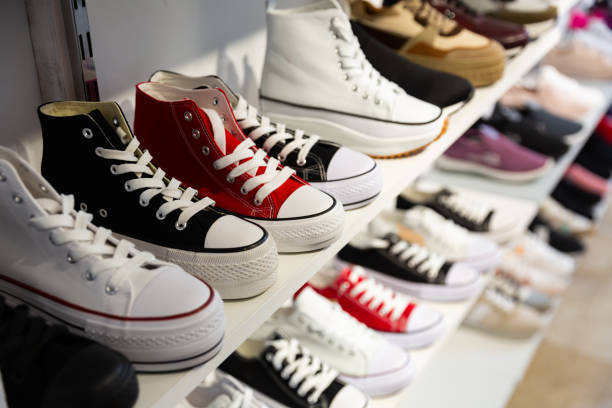istock Different colorful sport shoes are on shelves 1438568191