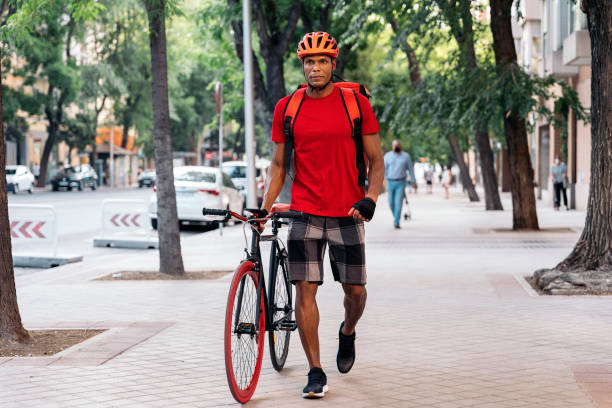 istock Delivery Man in the Street 1438569471