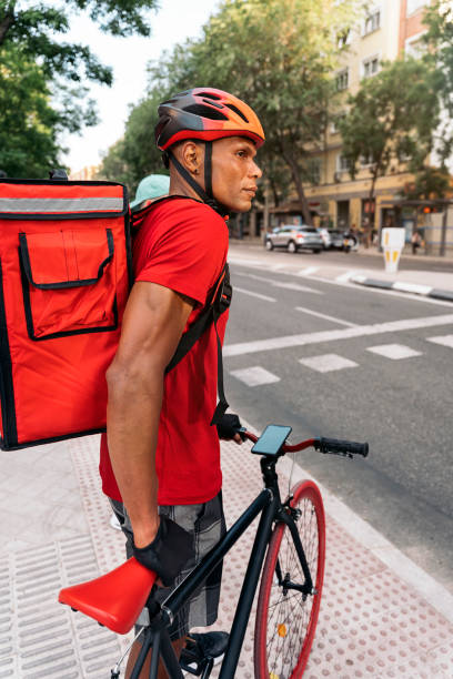 istock Delivery Man in the Street 1438569487