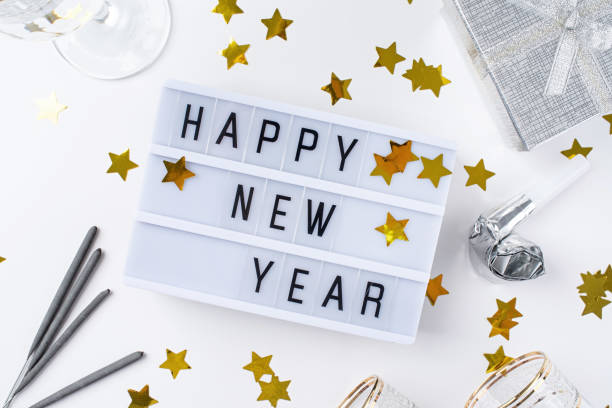 istock Happy New year displayed on a lightbox with decoration for New Year's Eve 1438570991