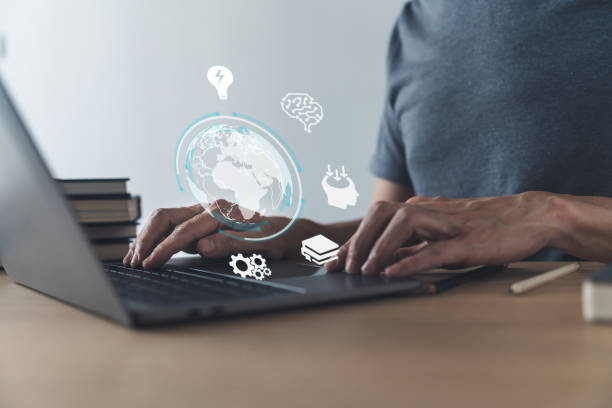 istock University student using laptop for studying, working or reading via internet or cyberspace. Learning or training skill course or classroom online at home. Conceptual idea of education or e-learning 1438571294