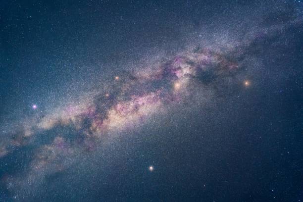 istock Nebulas and galaxies in the dark starry sky 1438571891