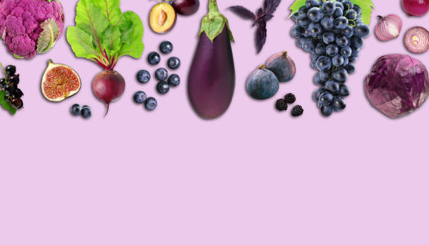 istock Creative layout made of red cabbage, eggplant, onion, basil, fig, cauliflower, blueberry, plum, grape, beetroot, blackberry on the purple background. 1438572613